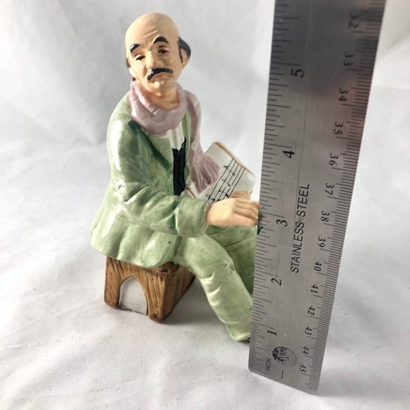 Vintage Porcelain Figurine Sitting Man in Green Suit Holding Sheet Music Hand Pa - Picture 8 of 9